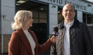 Still from the Bank of Dave with Florence Hall and Rory Kinnear