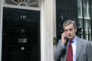 still of Peter Capaldi as Malcolm Tucker outside 10 Downing Street